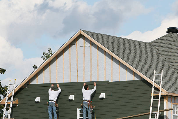 Professional Siding technician working in Eldorado, TX